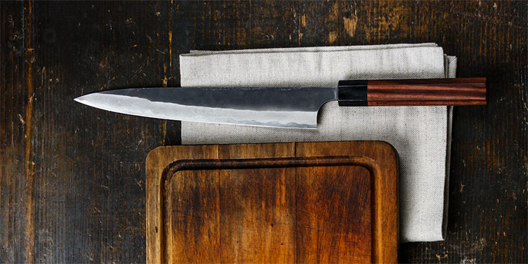 Japanese Kitchen Knife on a board