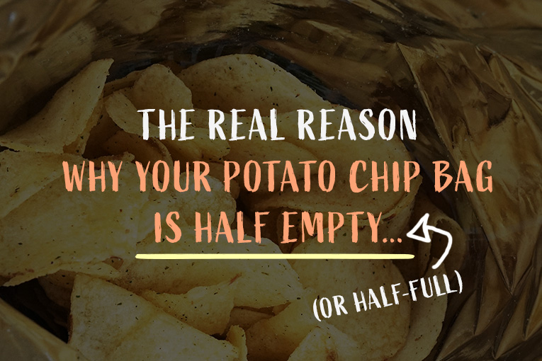 The inside of a pack of potato chips with the textthe real reason why your potato chip bag is half empty